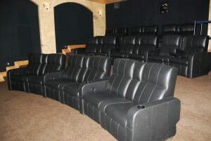 three rows of theater seats in home movie theater built by reeds built in