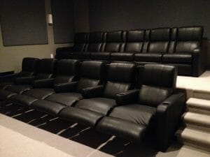 2 rows of black leather in home movie seating