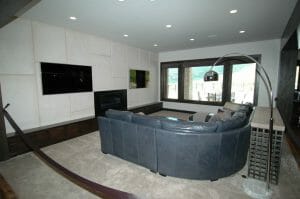 family room with entertainment system installed by reeds built in