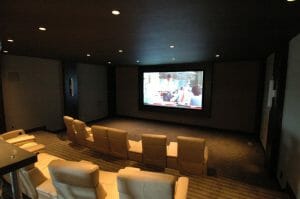 movie being displayed in home movie system | Reed's Built-Ins