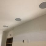 Whole house music system speakers installed into the ceiling of a Utah home | Reed's Built-Ins