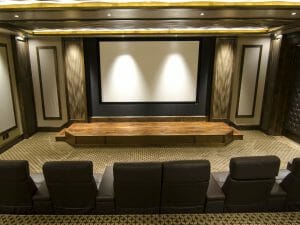 back view of movie seats and theater screen in a utah home