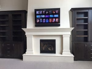 front view of in home tv above fireplace