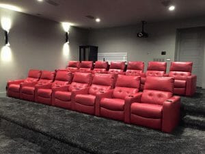 red leather seating for home movie system