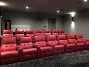 Red leather seats in a private home theater system