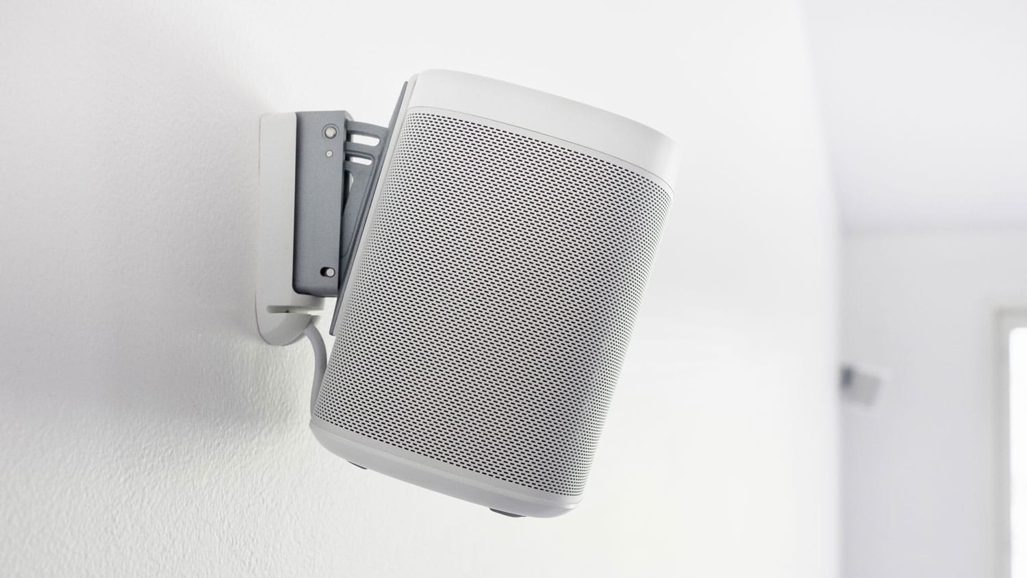 A high quality white speaker in a whole home audio system