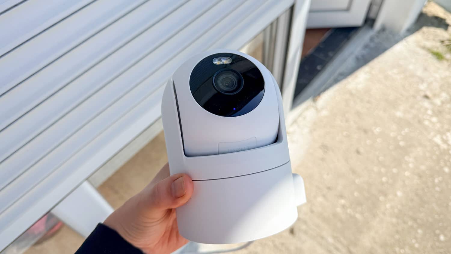 Installing a smart outdoor home security camera on a home exterior