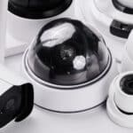 Assortment of wired and wireless home security cameras, including dome and bullet camera styles