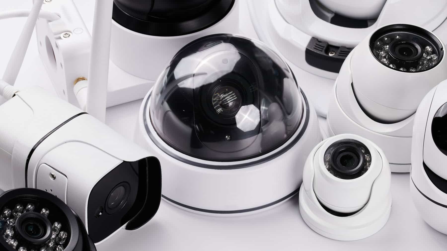 Assortment of wired and wireless home security cameras, including dome and bullet camera styles